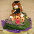 Graduation Floral Arrangements - 8 inches graduation bear (brown) with 10 Gerbera bouquet