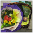 Floral Basket Arrangements with 1 Lily, 3 Roses & 2 Carnation (Price listed exclude the books)