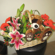 Floral Basket Arrangements with 2 Lilies, 10 Gerberas & Bear (8 inches)