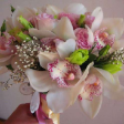 Bridal Bouquet with Cymbidium paired with Eustoma and a butterfly